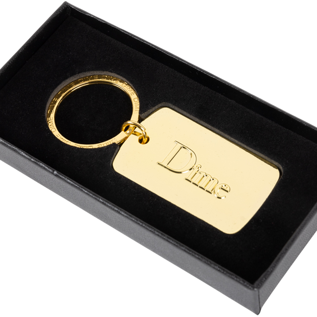 ACCESSORIES_SU26_KEYCHAIN_GOLD-01-Photoroom.png
