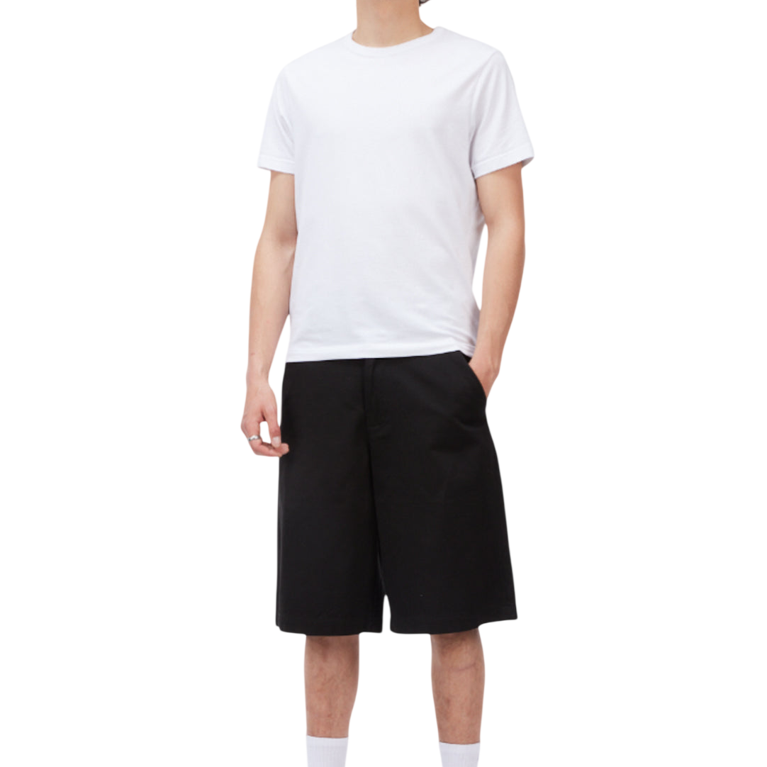 Bottoms_SU26_BaggyChinoShorts_Black_Model_01-Photoroom.png