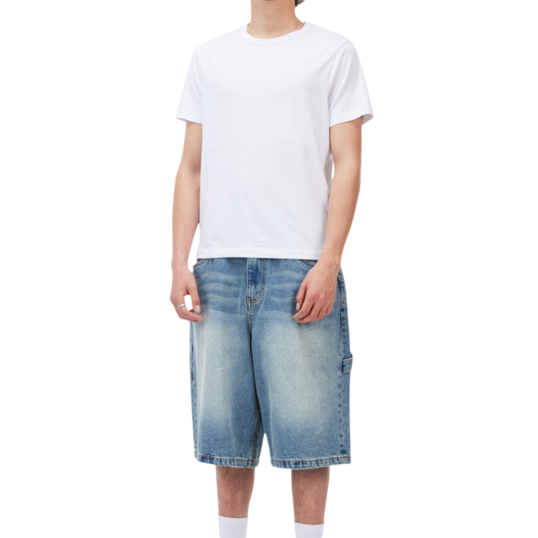 Bottoms_SU26_ClassicDenimShorts_SandblastedIndigo_Model_01-Photoroom.png