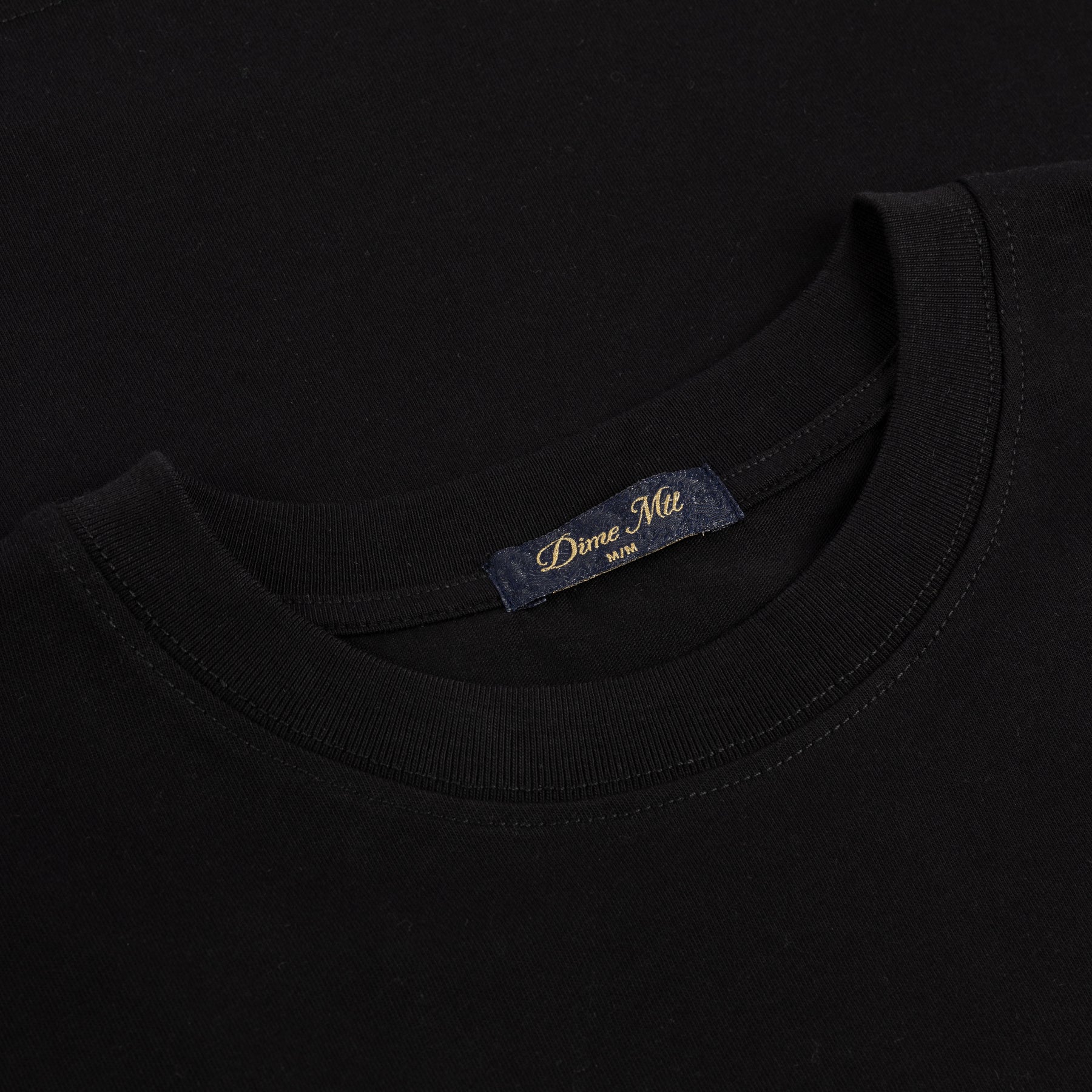 TSHIRTS_FA25_SMALLOGO_BLACK_HALF-02_1800x1800_03444839-5c1d-4b55-b2e6-3789cb60cde8.jpg