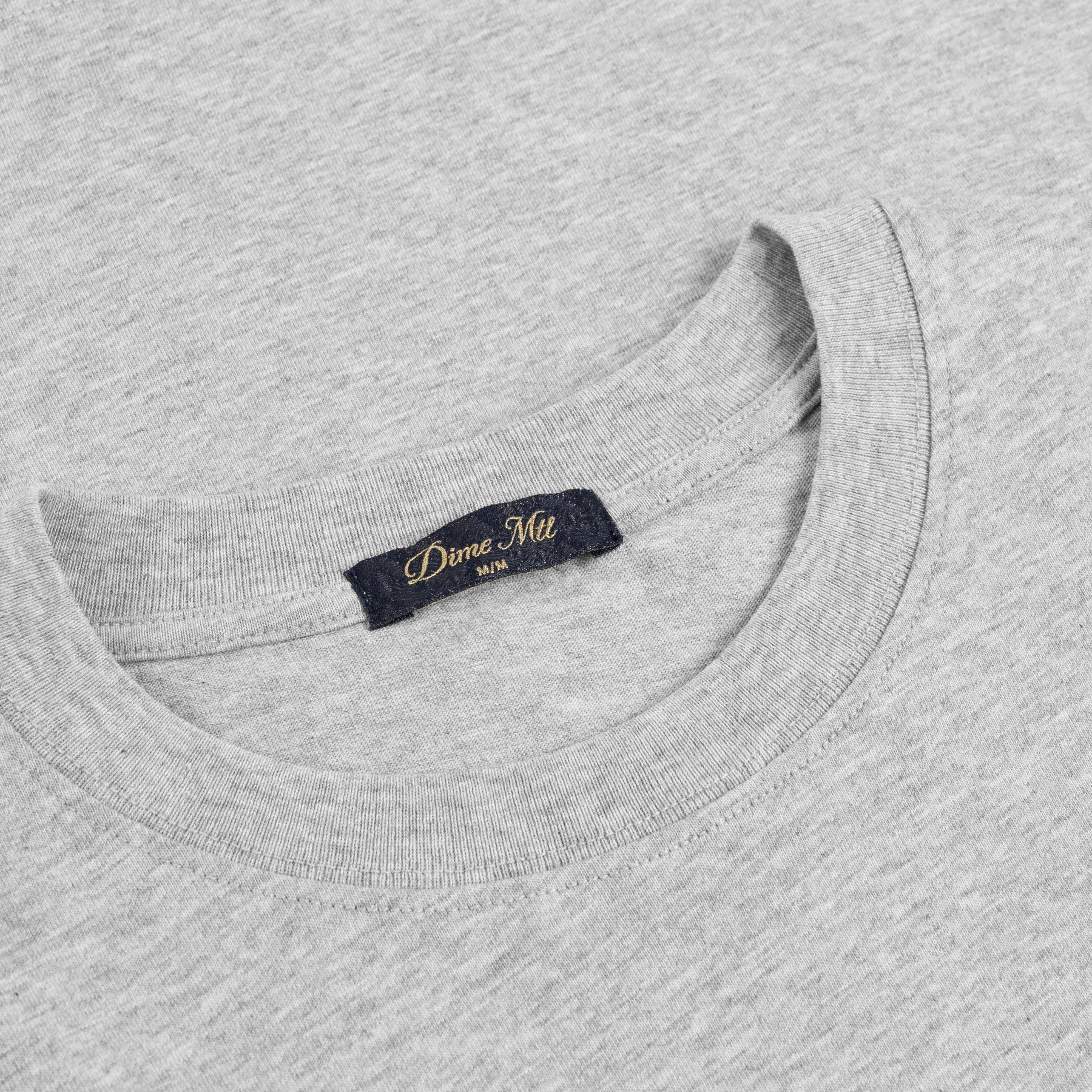 TSHIRTS_FA25_SMALLOGO_HEATHERGRAY_HALF-02_1800x1800_813f6e1f-ae7f-4e29-b542-4cb588e4a7de.jpg