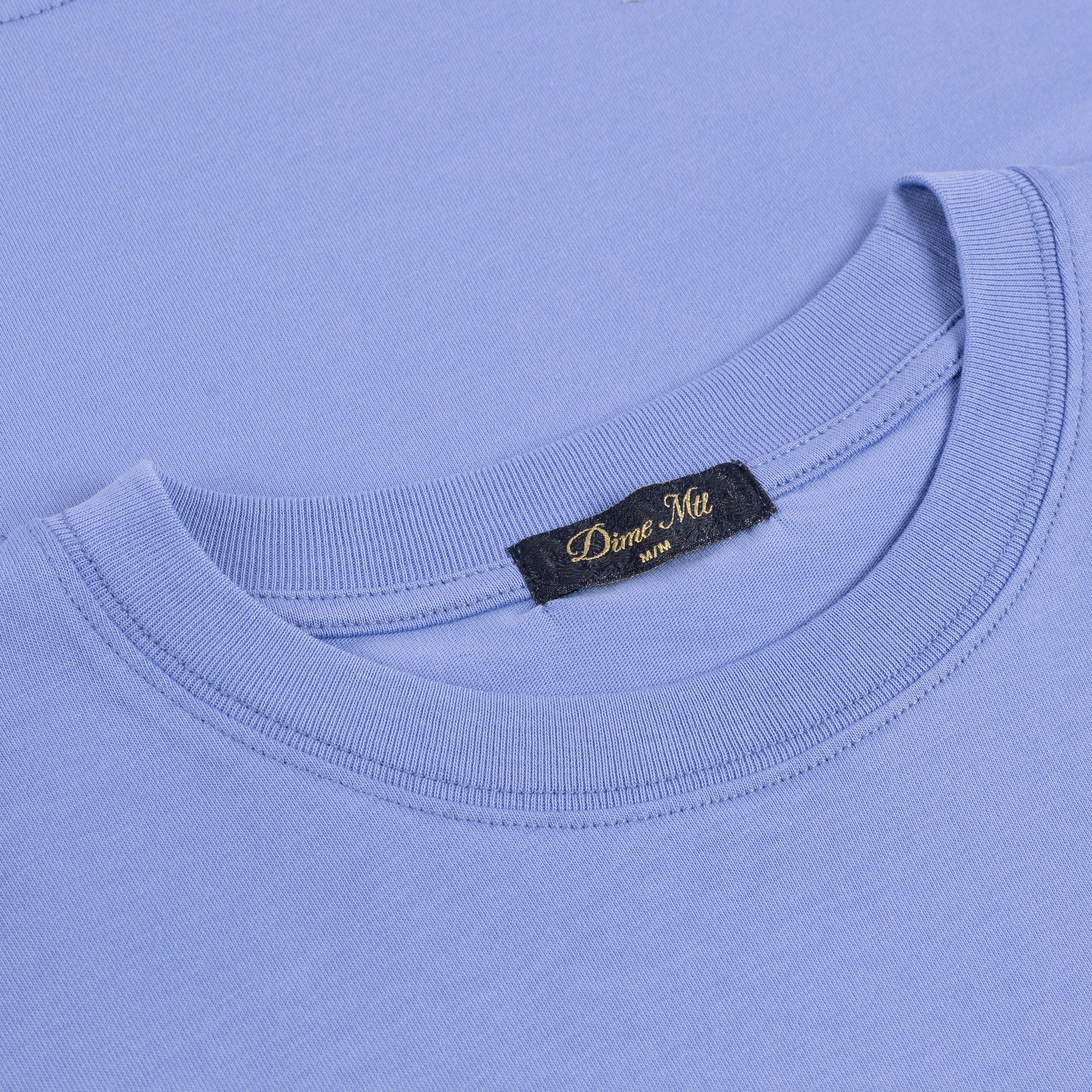 TSHIRTS_FA25_SMALLOGO_LTINDIGO_HALF-02_1800x1800_44465ca8-2160-4bdd-a65e-4cd41e2eb07a.jpg